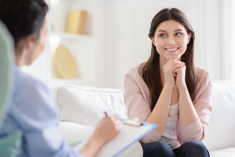 Woman receiving personalized coaching support from a licensed therapist